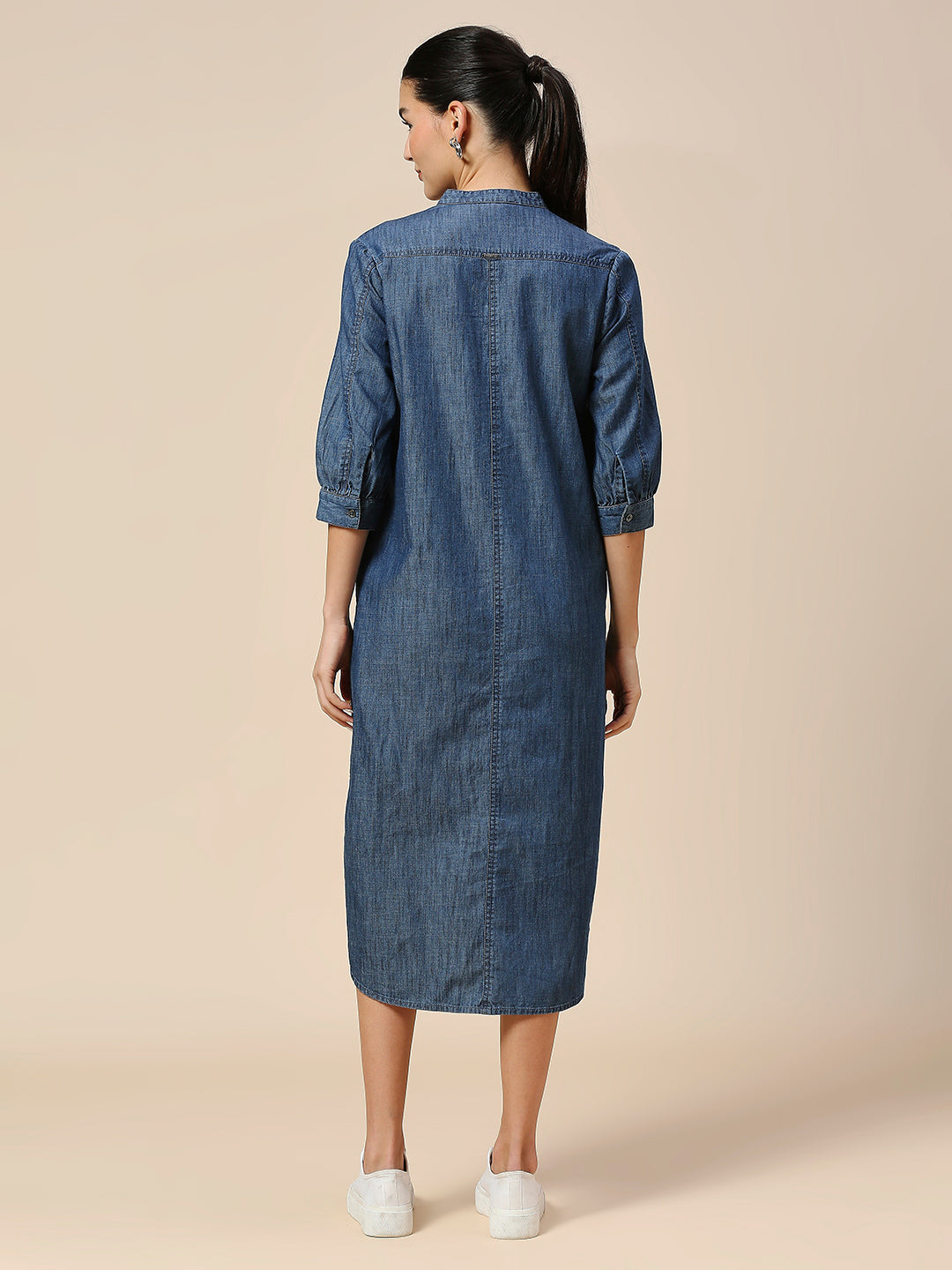 MID WASH DENIM POP OVER SHIRT DRESS WITH A HIGH - LOW HEMLINE