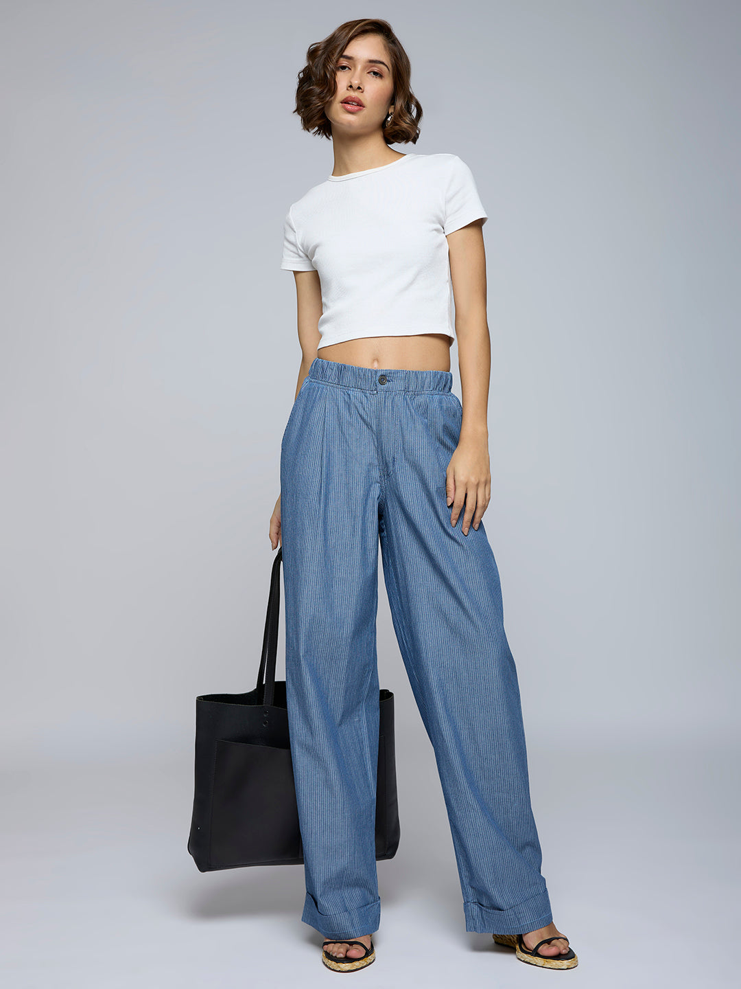 STRIPED DENIM PLEATED FLUID JEANS