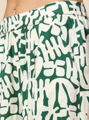 OVERBLOWN CACTUS GRAPHIC PRINTED SLIP ON FLUID PLEATED PANTS