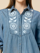 MID WASH DENIM LONGLINE SHIRT WITH INTRICATE LACE LIKE EMBROIDERY