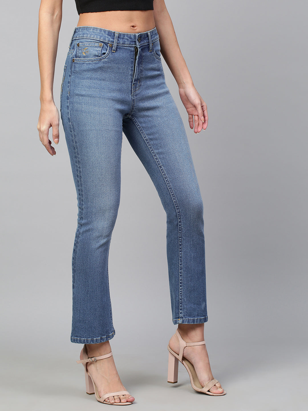 Mid Rise Boot Cut Mid Wash Jeans